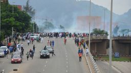 Police fired tear gas during a protest in Abuja, Nigeria, Thursday, Aug. 1, 2024. Thousands of mostly young people poured onto the streets across Nigeria on Thursday as they protested against the country's worst cost-of-living crisis in a generation. Security forces fired tear gas to disperse some of the protesters in the capital, Abuja.